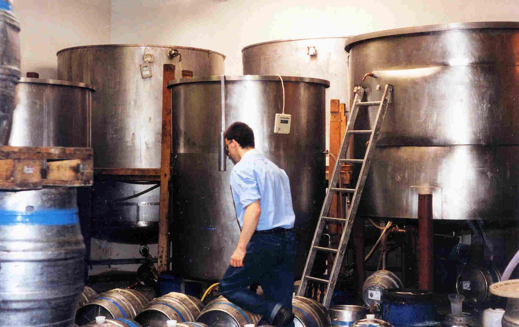 Brewer Andrew Cooke filling barrels around 1990